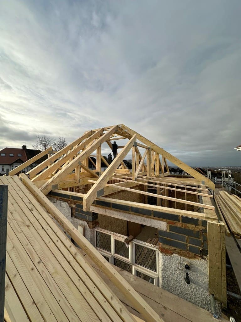 New timber roof trusses being installed on a residential property in Streatham